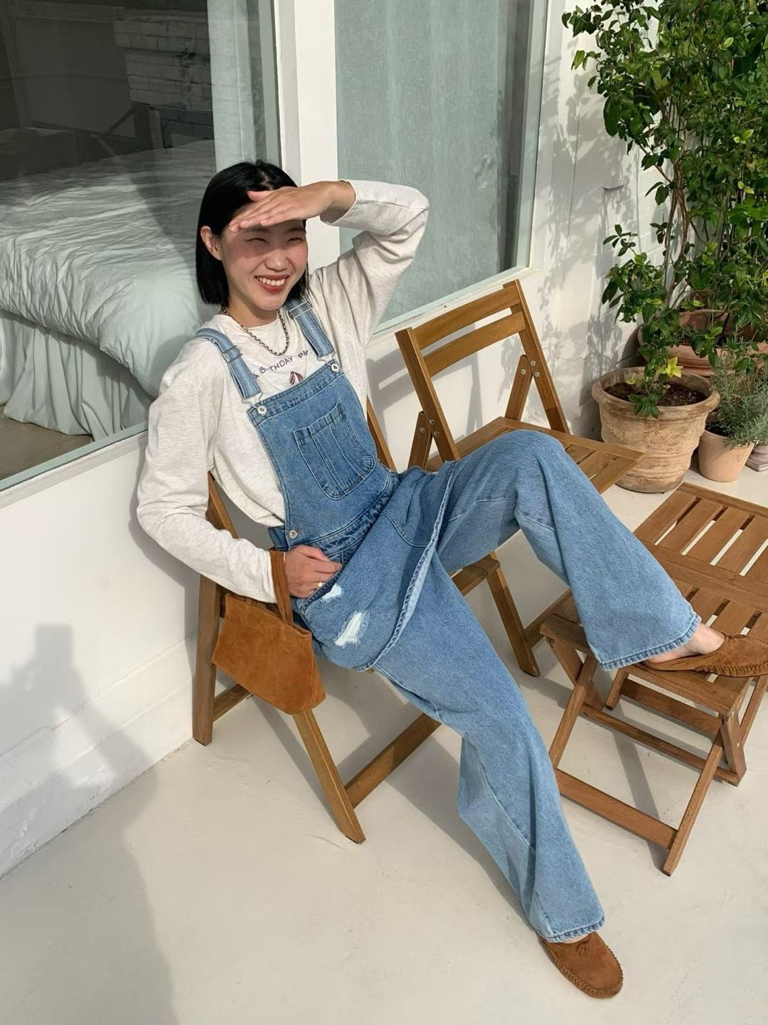 小圍裙設計牛仔吊帶褲